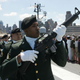 A military squad prepares to fire a salute aboard the USS Intrepid during a Memorial Day service May 30, 2005, in New York City.
David Turnley/Getty Images